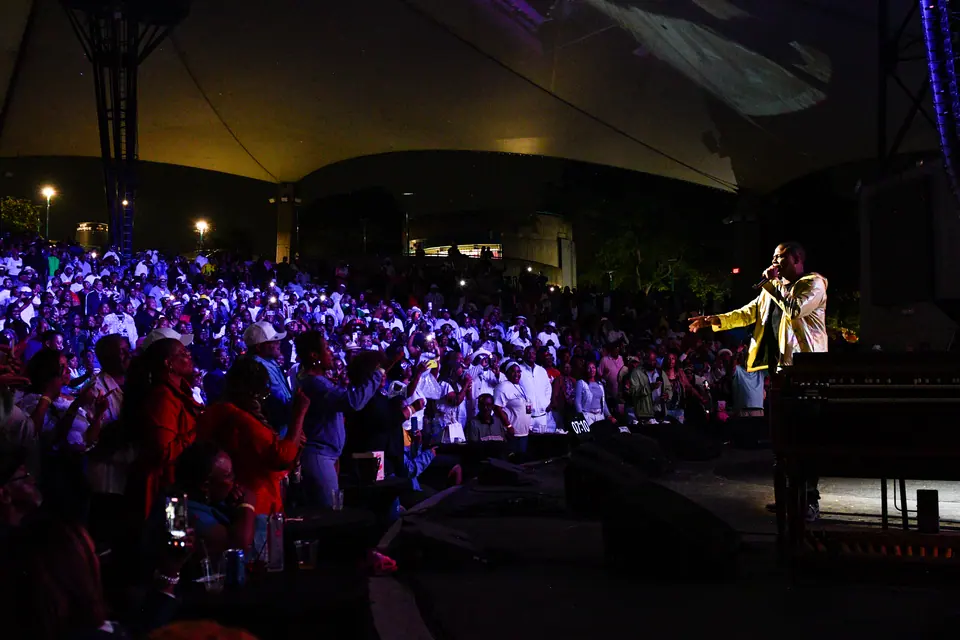 A performer commands a full amphitheatre at Jokes, Jazz & Jams